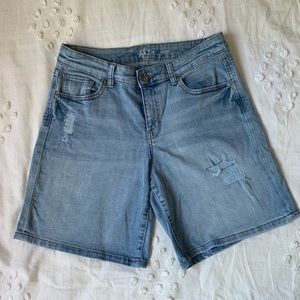 High waisted jean shorts with distressing on thighs